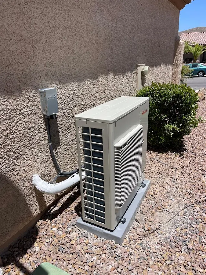 Residential air conditioning condenser unit in Collinsville